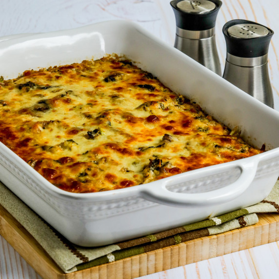 Cheesy Vegetarian Casserole with Cauliflower Rice shown in baking dish with salt and pepper in back.