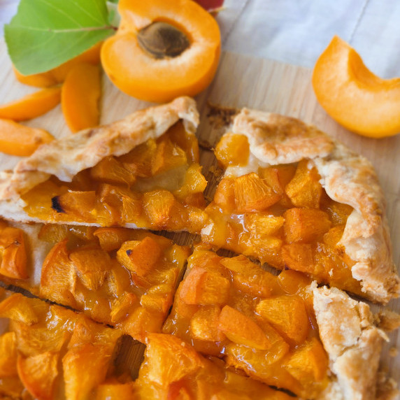 apricot crostata showing the flaky, buttery crust and fresh apricots