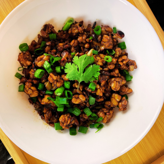 spicy and sticky tempeh in a bowl