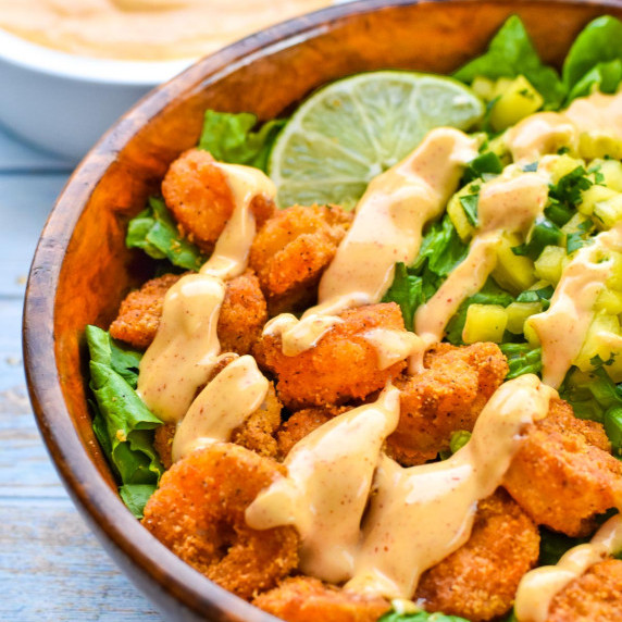 air fryer shrimp taco bowls with pineapple salsa dressed in chipotle mayo