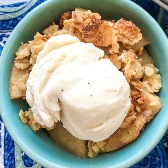 a bowl with apple crisp served