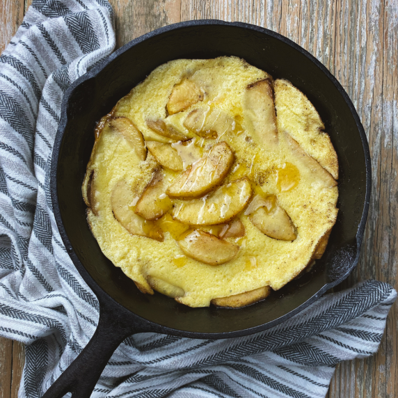apple pancake cooked in a cast iron skillet