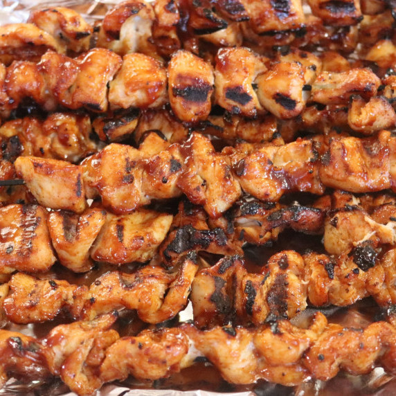 Several skewers of Barbecued chicken kebabs