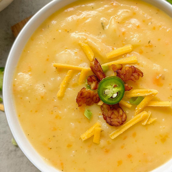 finished vegan baked potato soup in a white bowl