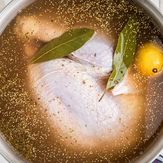 Turkey sitting in some brine.
