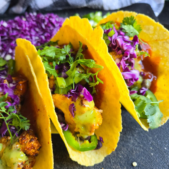Golden tortillas stuffed with colourful veggies and herbs.