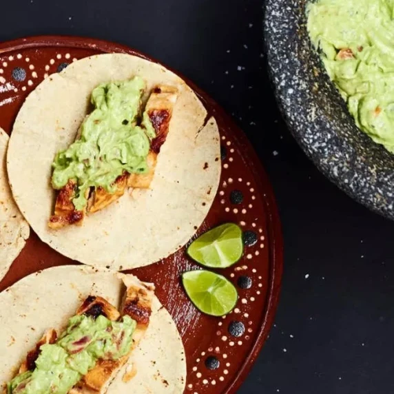 Chicken tacos with avocado salsa