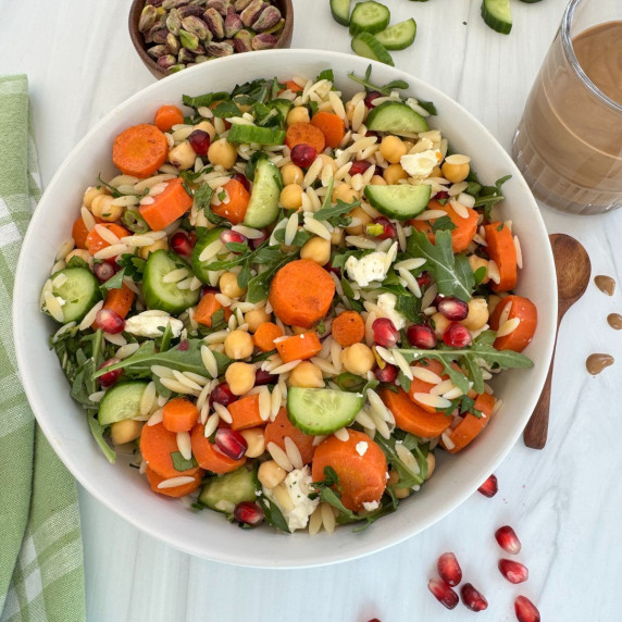 A bowl of Chickpea Orzo Salad. 