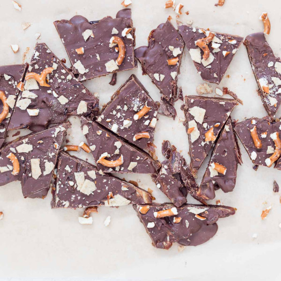 Christmas Crack Date Bark pieces on natural parchment paper