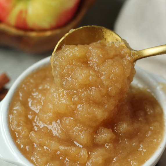 easy crockpot applesauce in a white dish