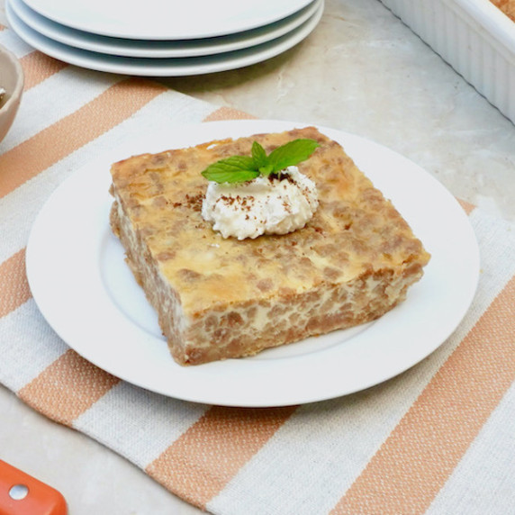 Grape-Nut Pudding on a white serving plate.