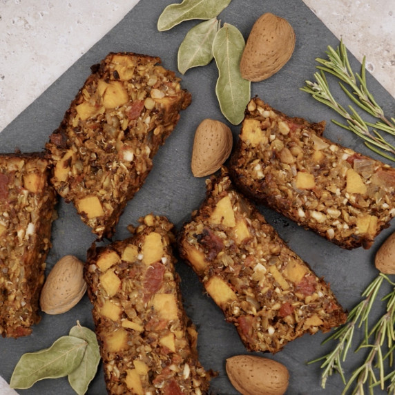 Slices of nut roast on a slate