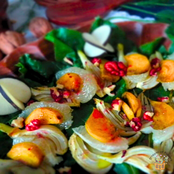 Fennel and Beet Salad with white grapefruit and beet greens with pomegranate vinaigrette and walnuts