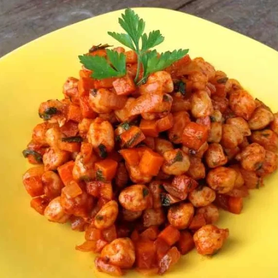Garbanzo Beans, Carrots and Onion In a Guajillo chile sauce.