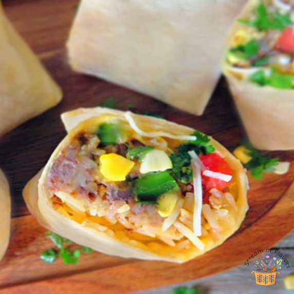 ground chicken burritos with chicken, red rice, refried beans, corn, salsa, cheese and Greek yogurt
