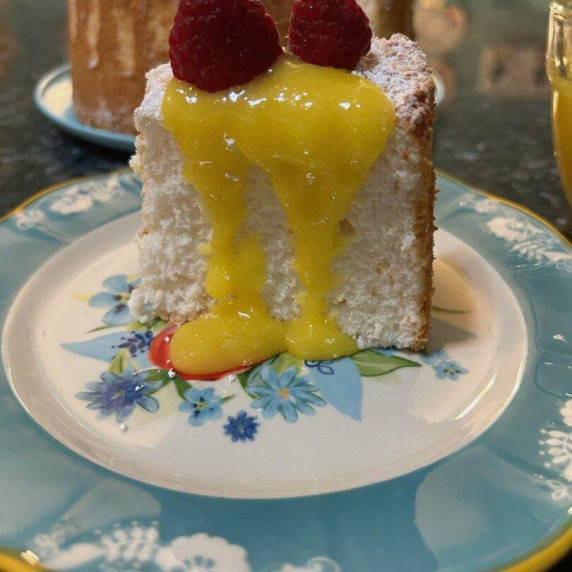 light bright angel food cake with fresh lemon curd and raspberries