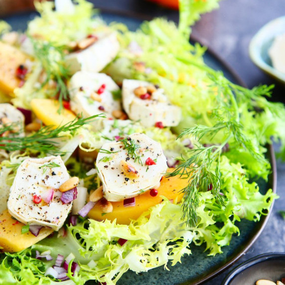 Persimmon and Frisée Salad with Goat Cheese