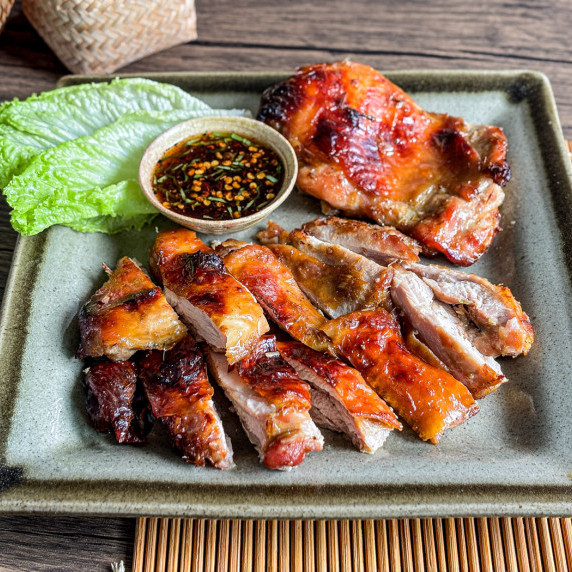 Thai grilled lemongrass chicken served with nam jim jaew sauce.