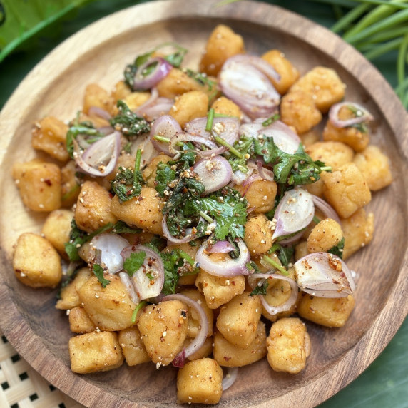 Top-view of Thai tofu larb, a fried egg tofu salad.