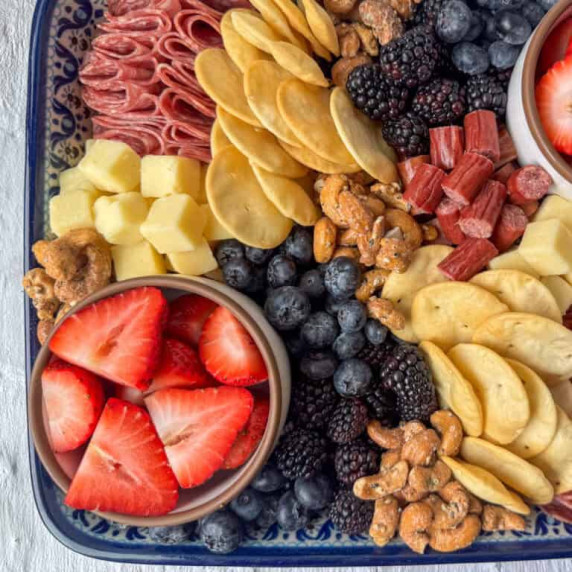 Overhead view of a corner of a charcuterie board made from ingredients from Aldi 