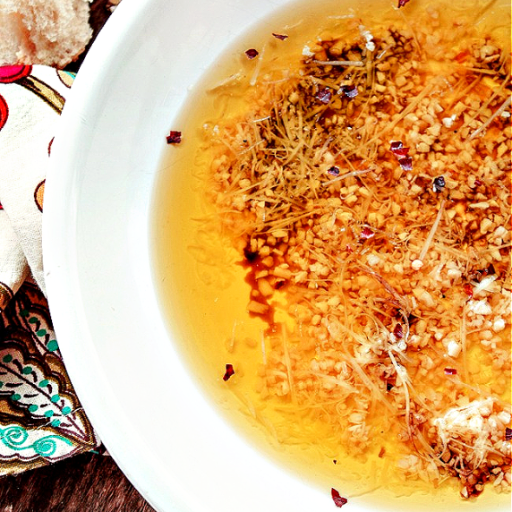 Italian Dipping Oil in a white bowl.