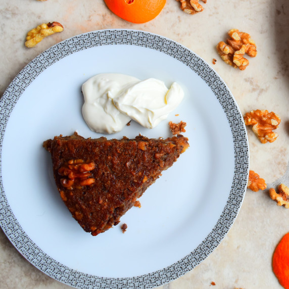 Karidopita Greek walnut cake served with a dollop of ice-cream