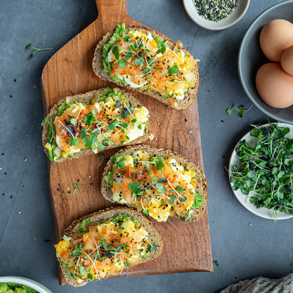 Kimchi toast on wood cutting board