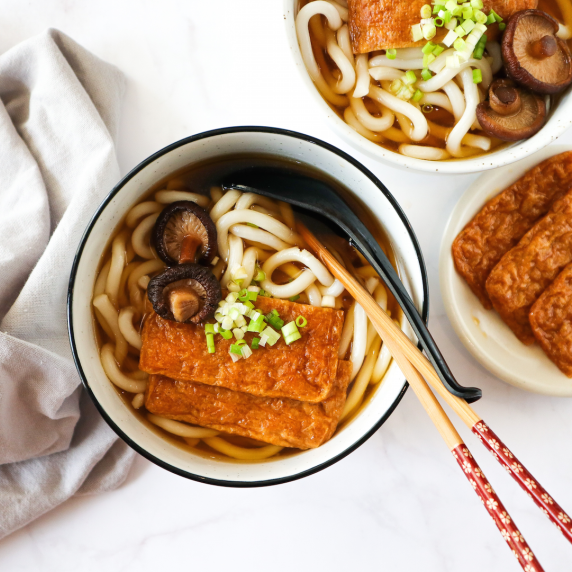 Vegan udon with tofu and mushrooms