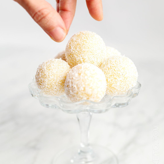 Coconut protein balls with shredded coconut.