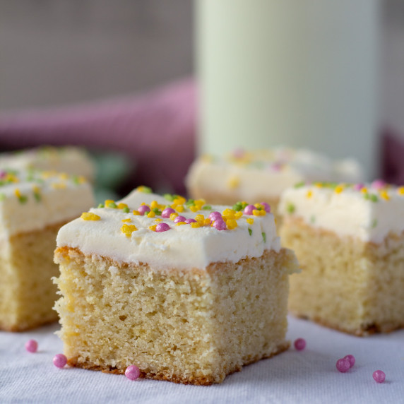 Squares of lofthouse cookie bars with sprinkles