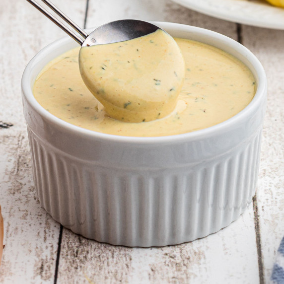 Close up of a bowl of mcdonalds breakfast sauce.