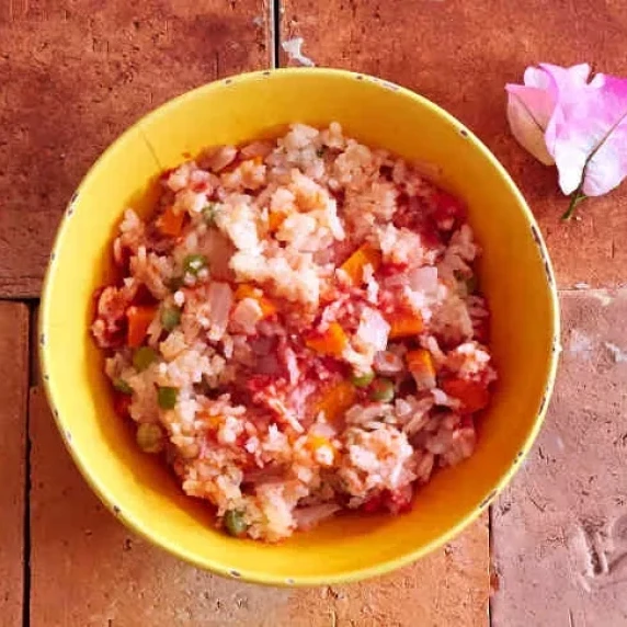 Mexican Red Rice in a yellow bowl