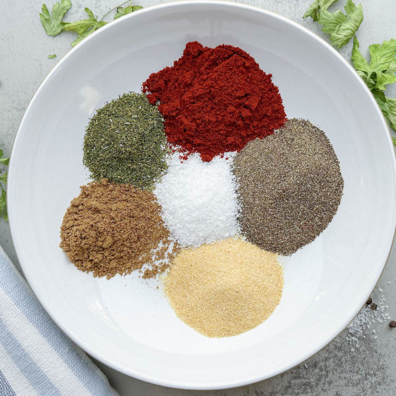 finished montreal steak seasoning in a glass jar
