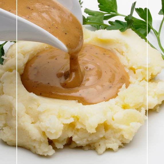 pouring thick homemade gravy over mashed potatoes