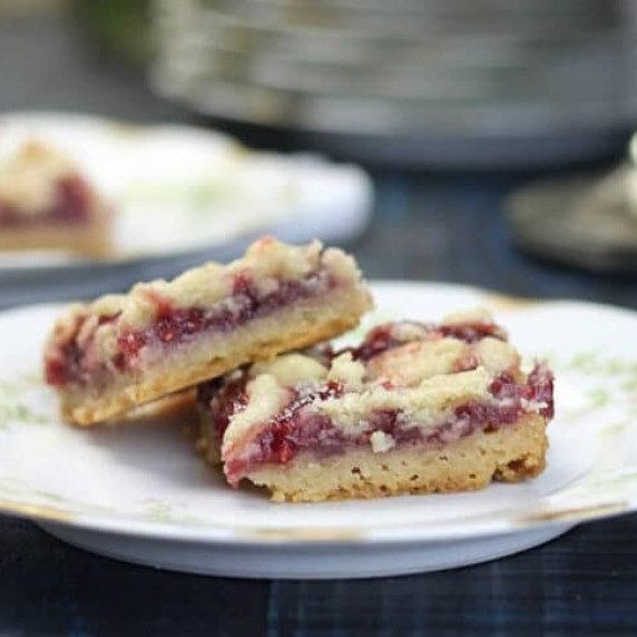 This buttery shortbread is topped with raspberry jam mixed with fresh raspberries