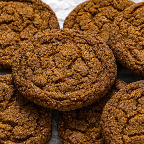 Ginger biscuits on a cooling rack.