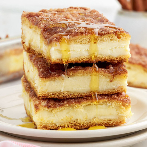 Simply layer crescent dough with an easy cheesecake filling, top again with crescent rolls, then add
