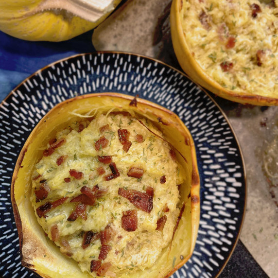 Spaghetti Squash Bowls filled with spaghetti squash bacon and almond ricotta cheese