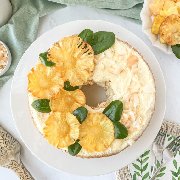 top view of tropical angel food cake on a white plate