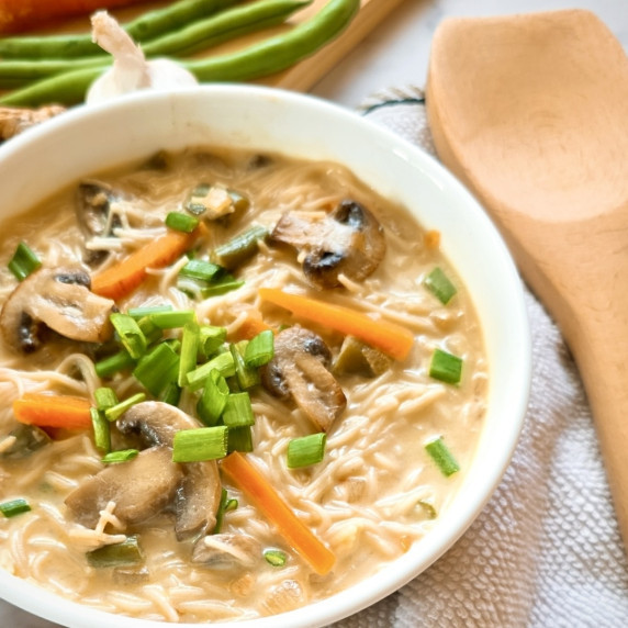 Vegetable Noodle Soup Recipe in a white bowl.