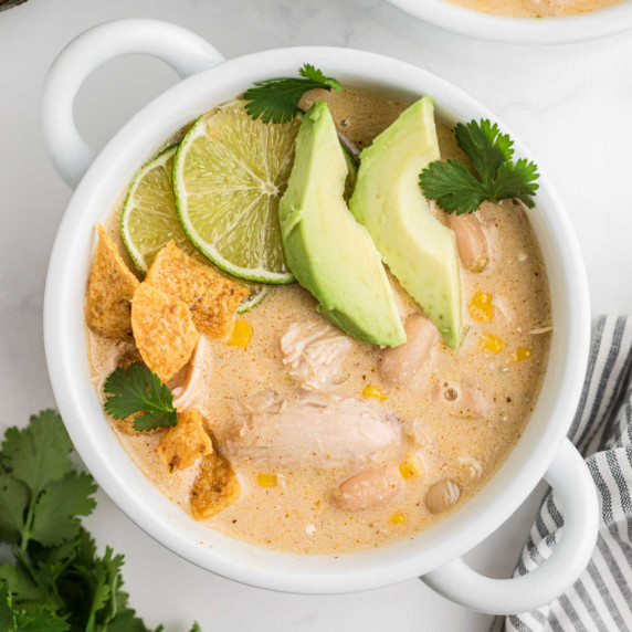 Overhead view of a bowl of white chicken chili.