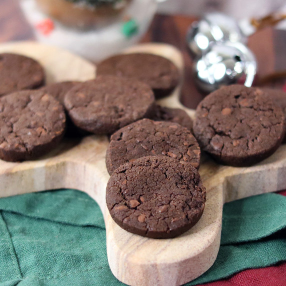 World peace cookies arranged on a holiday plate against a white background.