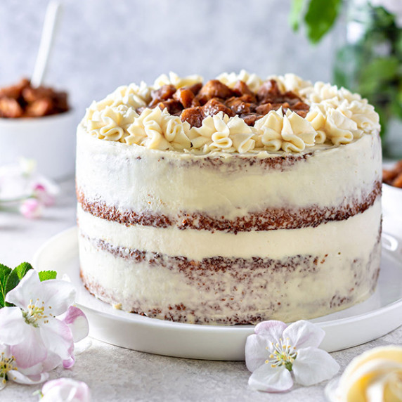 Photo of beautiful Almond Cake with Caramelized Apples & Cream Cheese Frosting with flowers