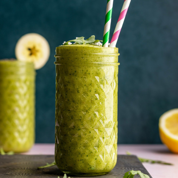 Arugula smoothie in a tall jar