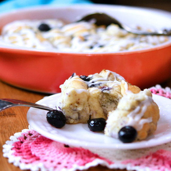 blueberry biscuit, fresh out of the oven, on a white plate