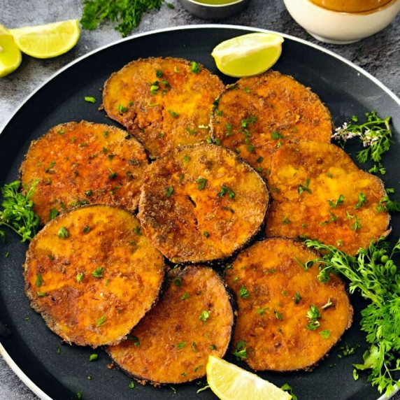 A crispy addictive snack recipe made with eggplants pan-fried along with spices. 