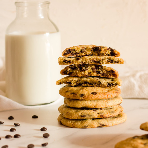 chocolate chip cookies stacked on top of each other 