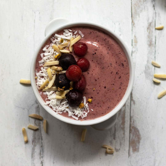 Cherry smoothie bowl overhead shot