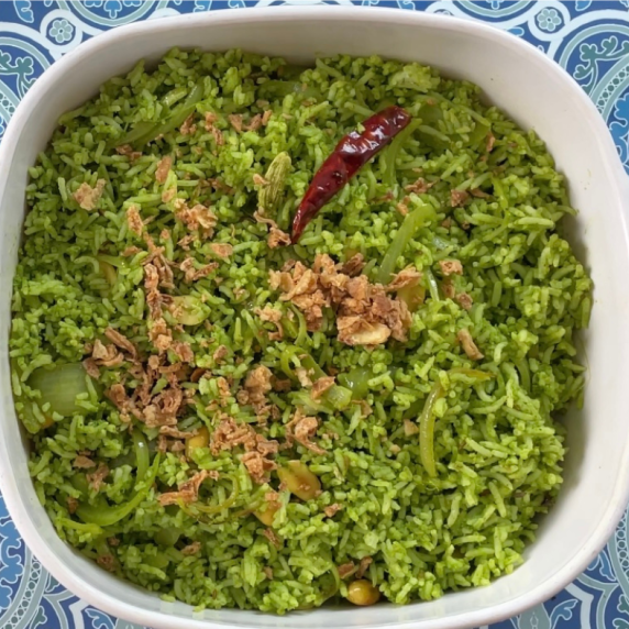 indian coriander rice in a white corning ware