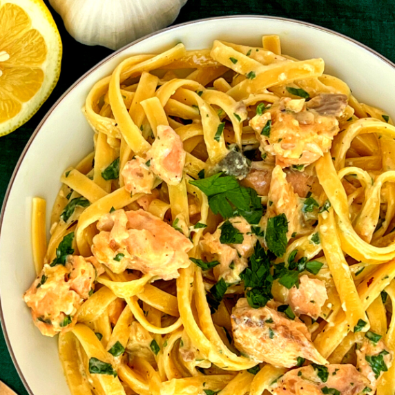 creamy garlic salmon pasta on plate
